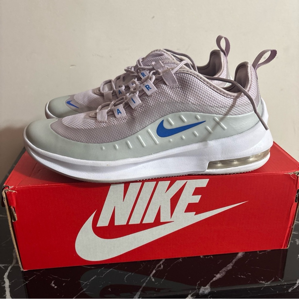 The Nike air maxi axis sneakers size 7Y